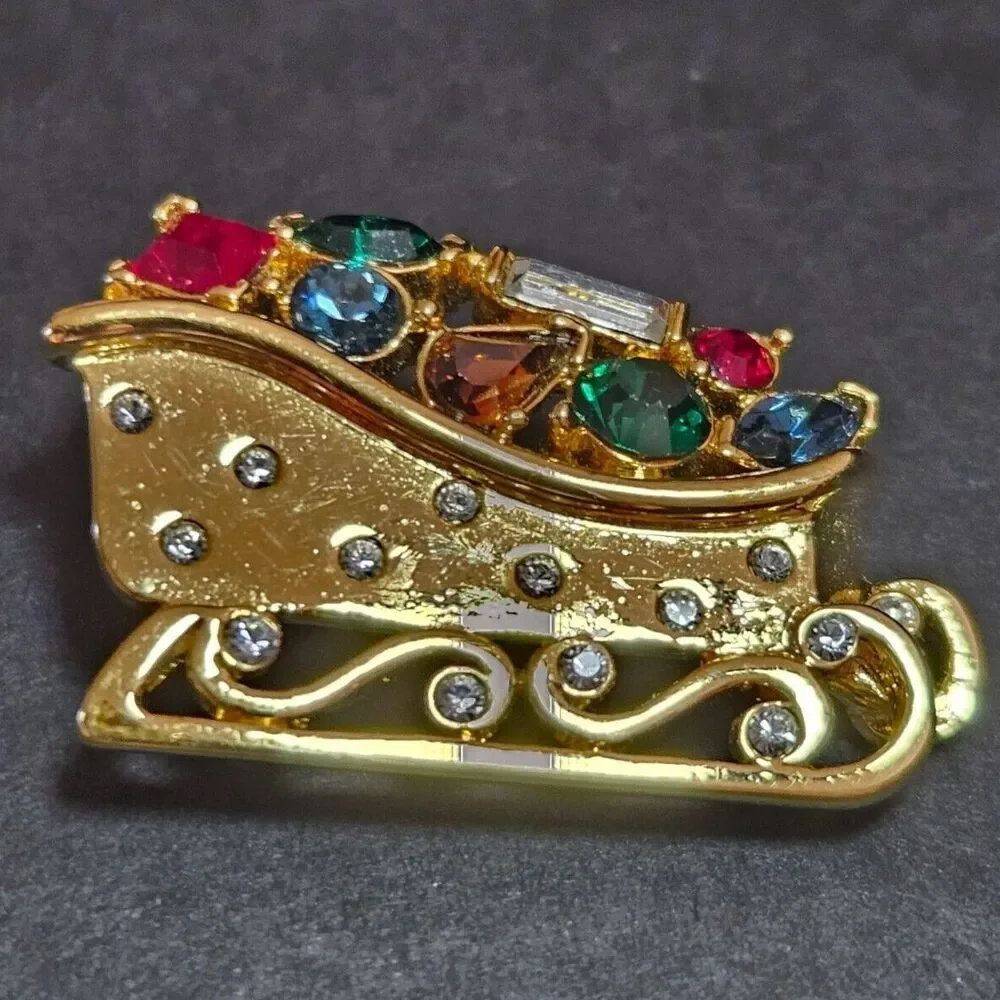 Vintage Monet gold tone sleigh brooch colorful